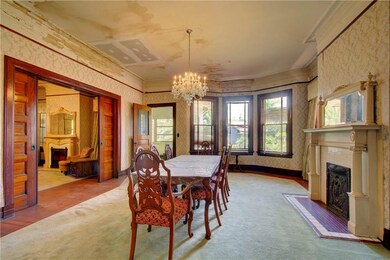 formal DR, formal LR to left, and sun room added i