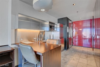 Kitchen with a sink, appliances with stainless ste