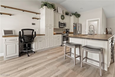 655 Trinity St E unit 8, Lehigh Acres, FL 33974 - photo 3