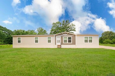 Manufactured / mobile home featuring entry steps a