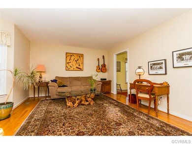 FAMILY ROOM W/ HARDWOOD FLOORS