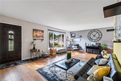Living room, dining room and kitchen all have bamboo flooring.