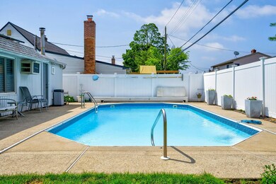 View of swimming pool featuring a patio area and a fenced backyard