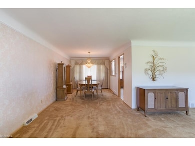 Formal dining room is steps from the living room l