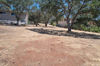 A view of the vacant lot for sale.