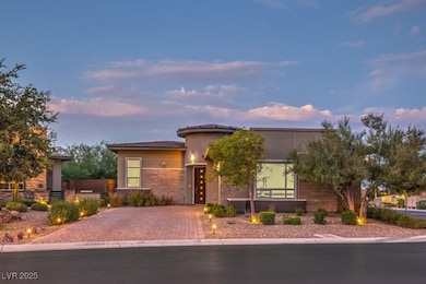 View of front of house featuring stucco siding and