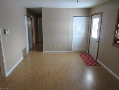 Wood laminate flooring and freshly painted through