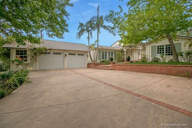 2 car spacious garage with potting shed on the wes