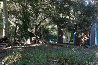 View of Dog house and Out Building 