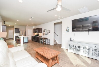 Family room opens to the kitchen.