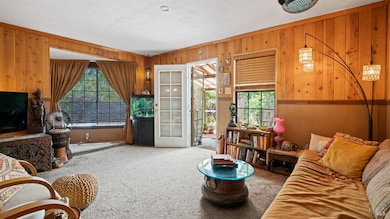 Living room, shows nook/office to the left