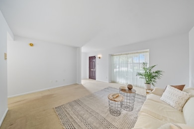 The living room overlooks one of the neighborhood’s most lush courtyards. Right upon entry, there is a south facing window and a large walk-in coat closet that continues along the wall under the staircase