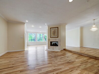 The gas burning, two-sided fireplace, allows for j