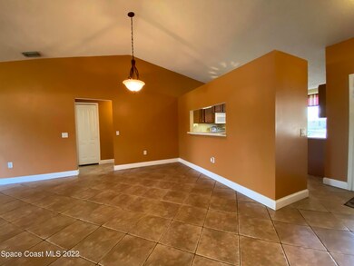 Dining and kitchen pass through