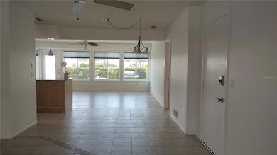 Dining Area, access to carport, and access to bedroom with ensuite bathroom.