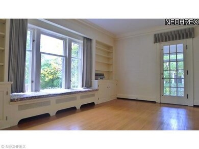 Family Room with hardwood floors, built-in's and w