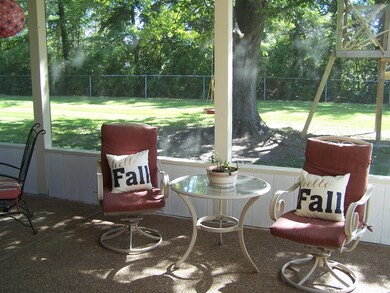 HUGE SCREENED PORCH! RENOVATED IN 2016 WITH NEW POSTS, KNEE WALL, SCREEN, DOOR, & 2 COATS OF PAINT!