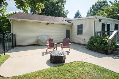 Large rear patio behind the garage.
