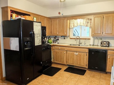 Kitchen comes fully applianced with nearly brand n