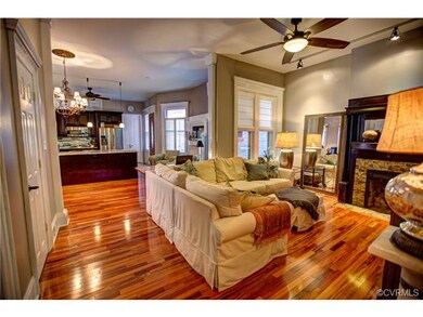 Unit 1- View of living room to the dining area and