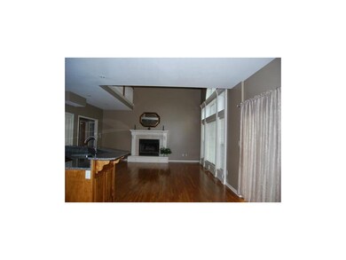 Open area showing Great Room and part of Kitchen