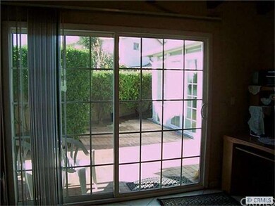 Sliding Glass Doors Leading to Outside Patio