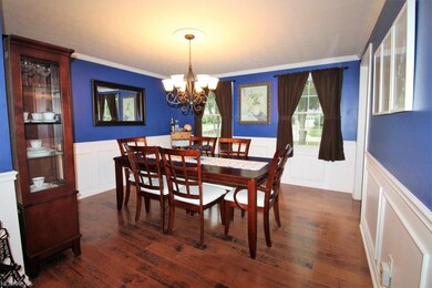 Formal Dining Room with Crown and Picture Frame Mo