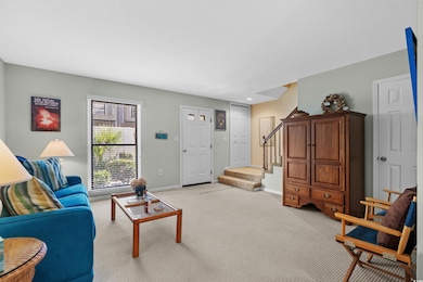 Living room with light colored carpet