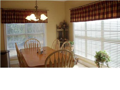lots of windows in this eating area - overlooks po