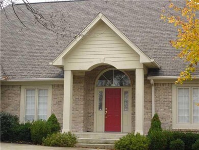 Entry. IMPRESSIVE ENTRY WITH LEADED GLASS SIDE PANELS AND COVERED FRONT PORCH