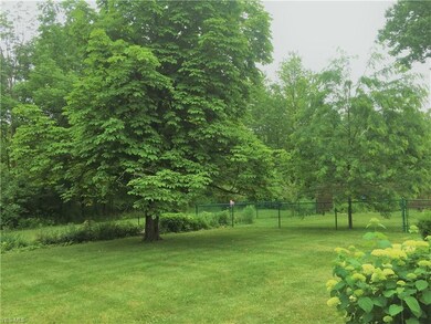 Part of the back private back yard is fenced in fo