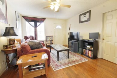 VIEW OF LIVING ROOM WITH 3RD BEDROOM OFF LEFT FROM