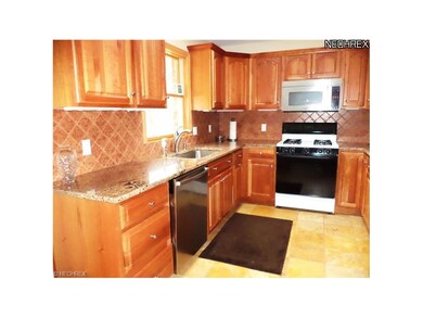 Kitchen with natural stone floor, Schrock natural 