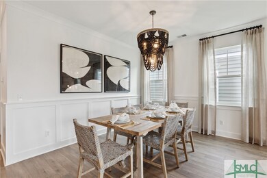 Dining Room. *Model home photography is for refere