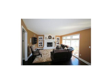 Great room with surround sound open to kitchen