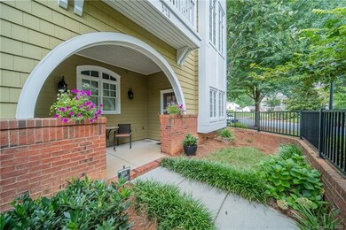 Great curb appeal with small fenced garden!