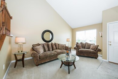 Big front windows add lovely natural light to this room!