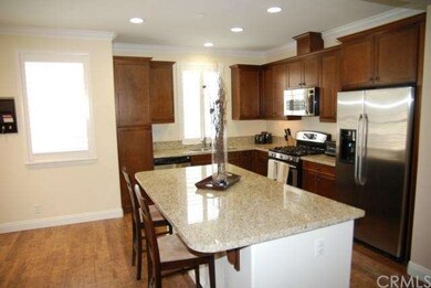 Granite kitchen with stainless appliances and gene