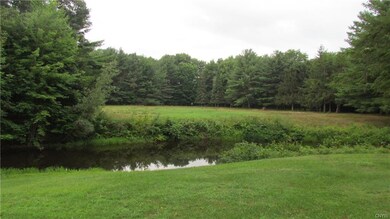 Pond mid way back to the river. Excellent building