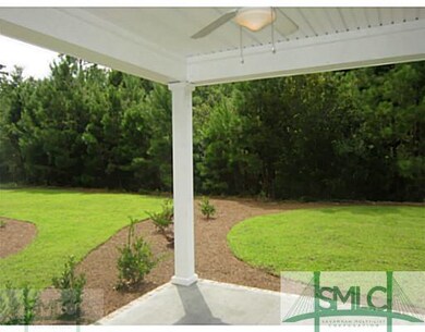 Exterior Back. Sodded yard and covered back porch!