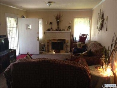 formal living room with fire place