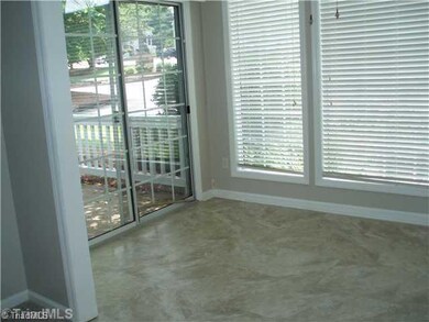 Sunroom. The sunroom has new flooring fresh paint.  What a lovely retreat with access to patio