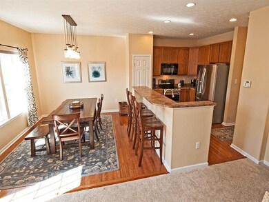ANOTHER VIEW OF THE DINING AREA WITH UPDATED LIGHT