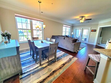 Dining space featuring dark wood-type flooring, cr