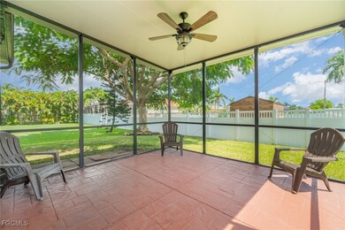 Unfurnished sunroom featuring ceiling fan