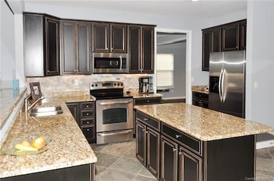 Beautiful Kitchen with Stainless Appliances