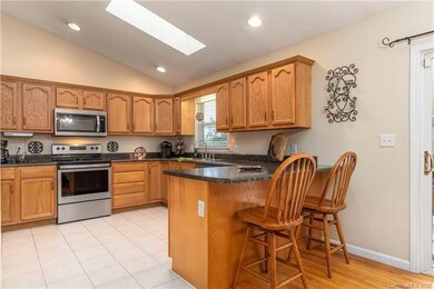 Light filled kitchen with stainless steel applianc