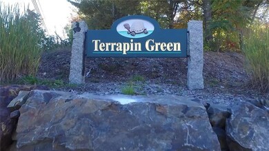 The entrance sign up on the hill