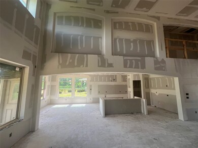 Great room with high ceilings - still under constr