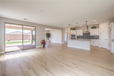 Unfurnished living room with light wood-style floo